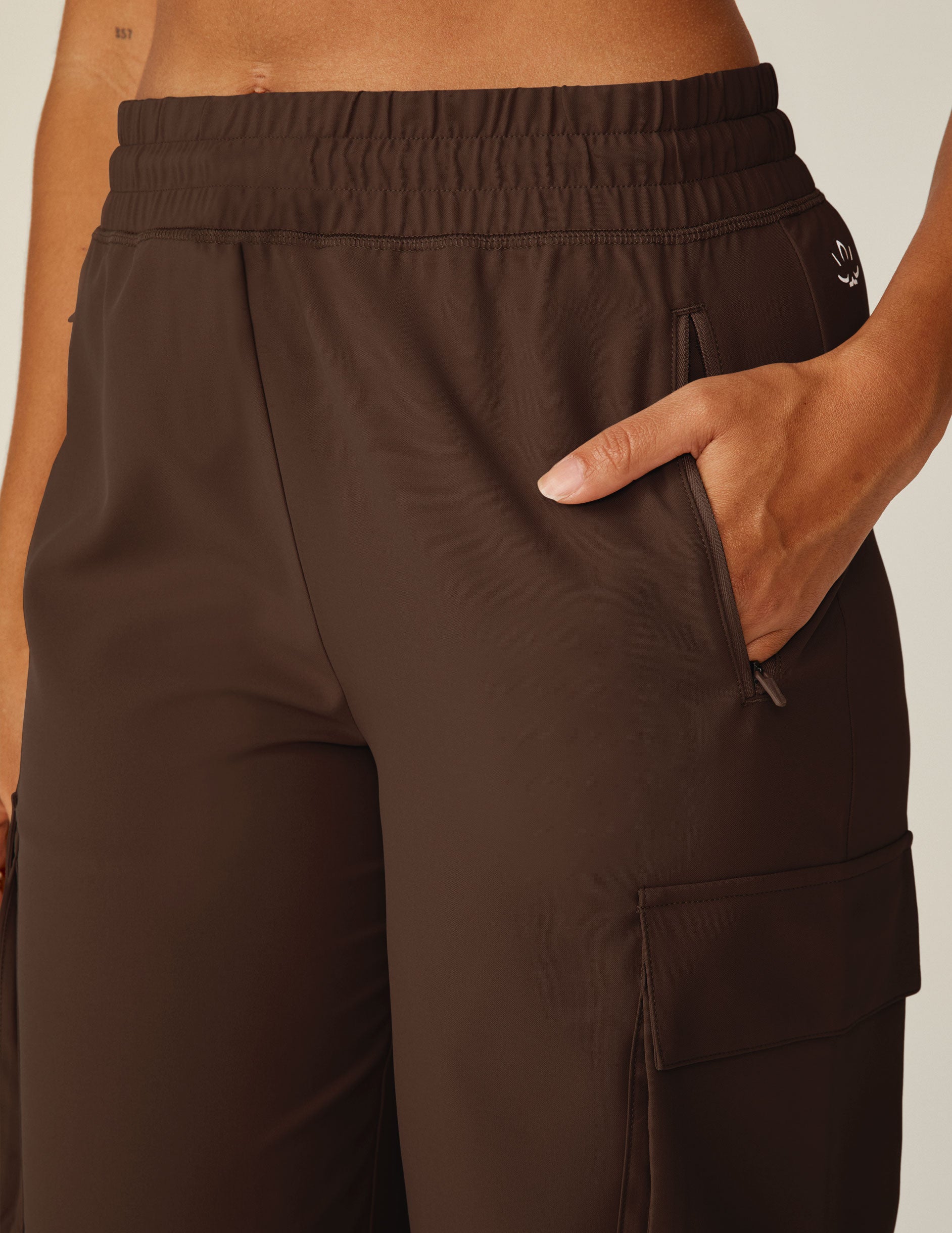 brown cargo style pants with side pockets. 