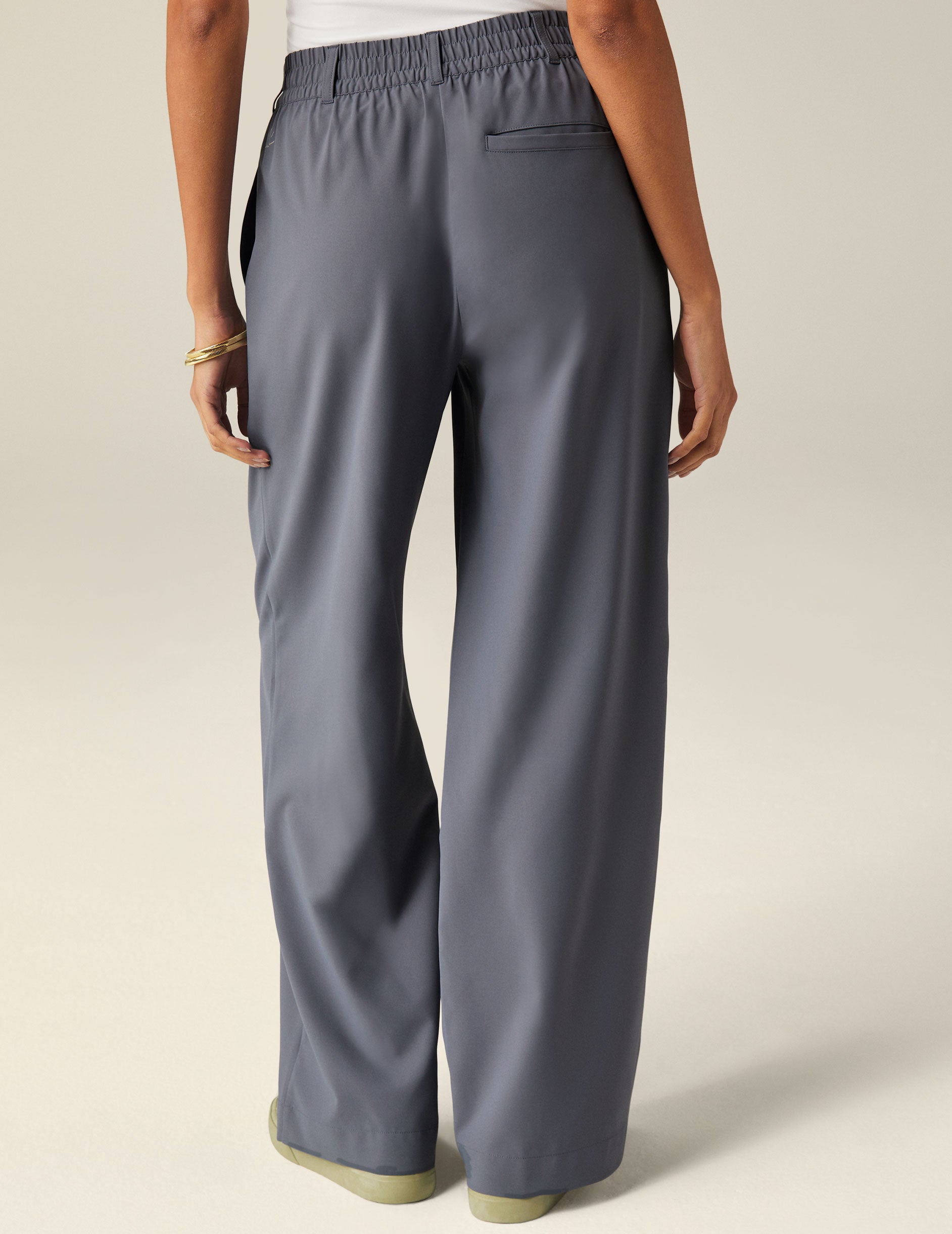 blue mid rise jetstretch woven pants with cargo style pockets. 