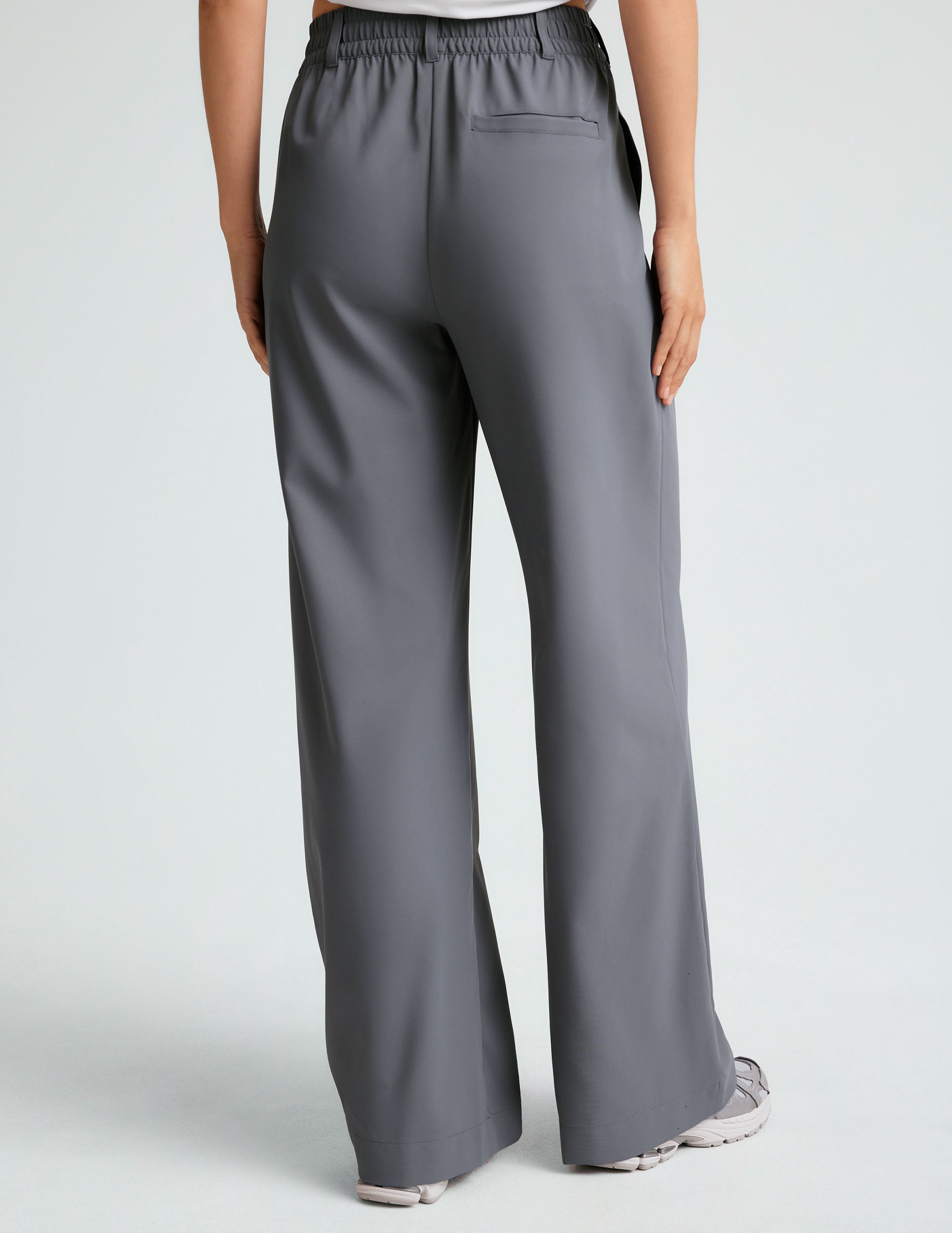 gray mid rise jetstretch woven pants with cargo style pockets.