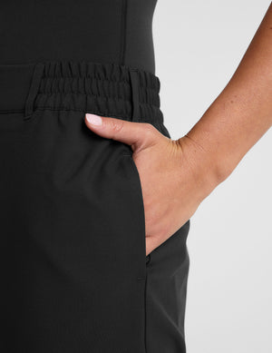 black trouser style pant with a tapered ankle and pockets. 