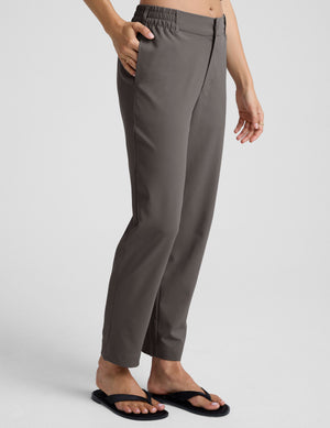 gray trouser style pant with a tapered ankle and pockets. 