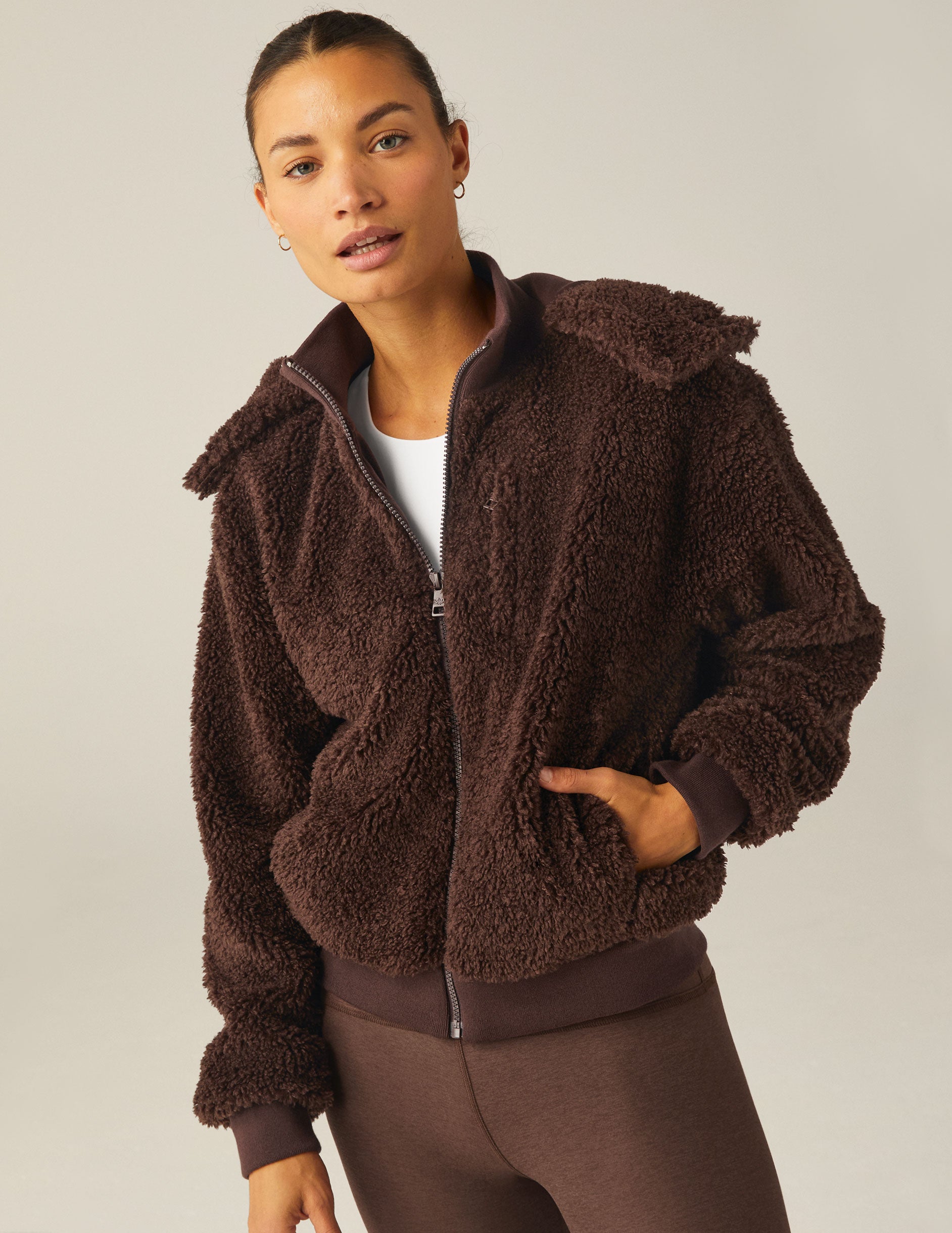 brown hooded faux sherpa jacket with pockets. 