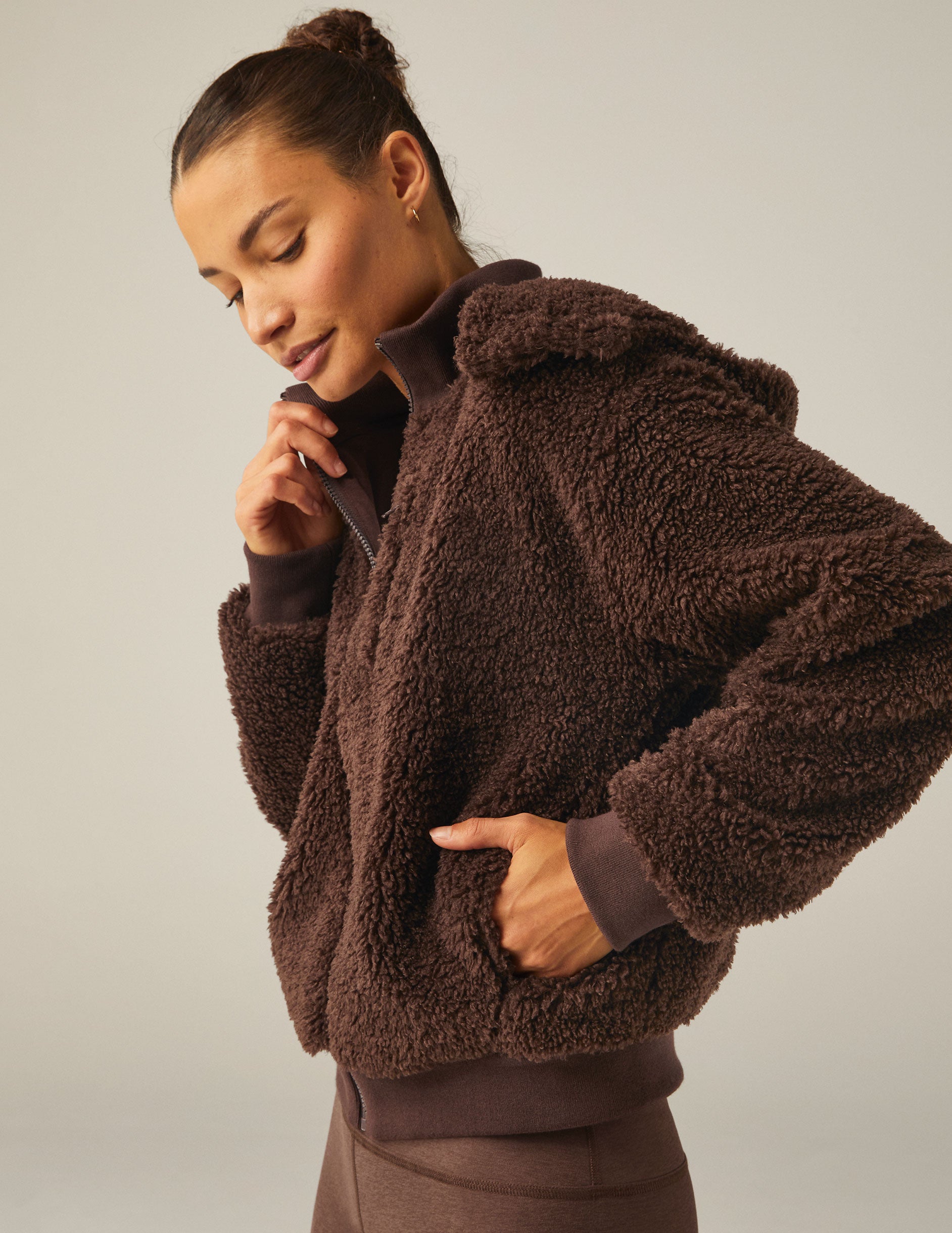 brown hooded faux sherpa jacket with pockets. 