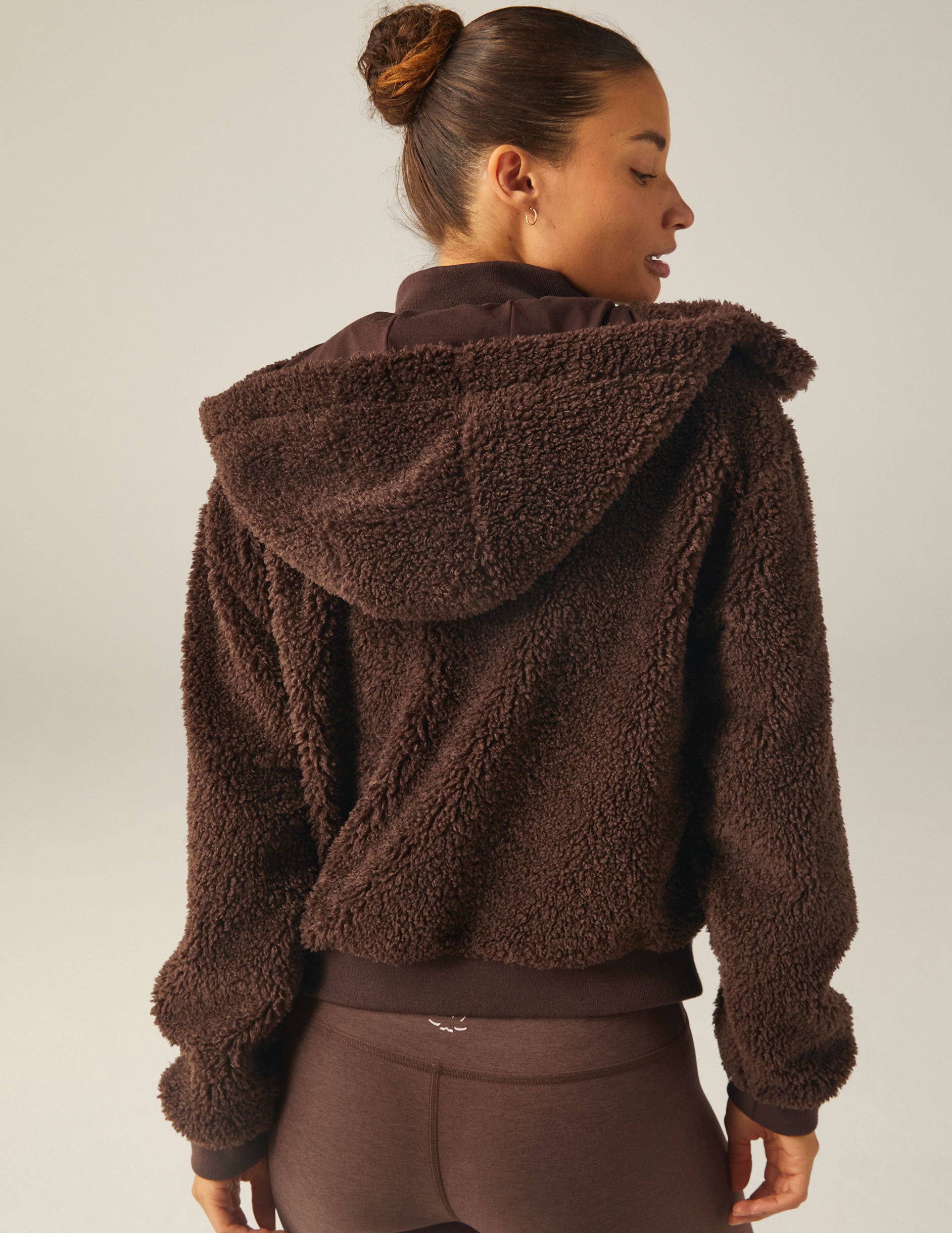 brown hooded faux sherpa jacket with pockets. 