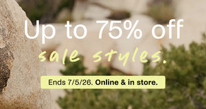 Promotional text overlay for sale event with a natural background. 