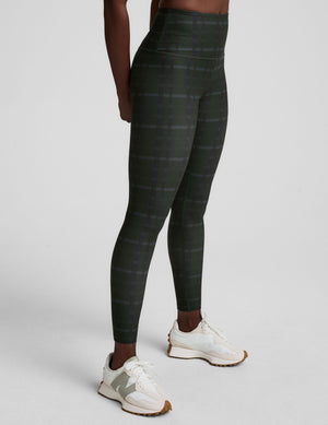 green plaid printed high-waisted midi length leggings. 