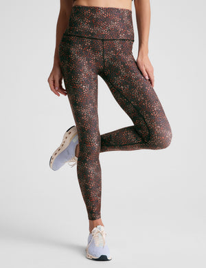 leopard printed high-waisted midi length leggings. 