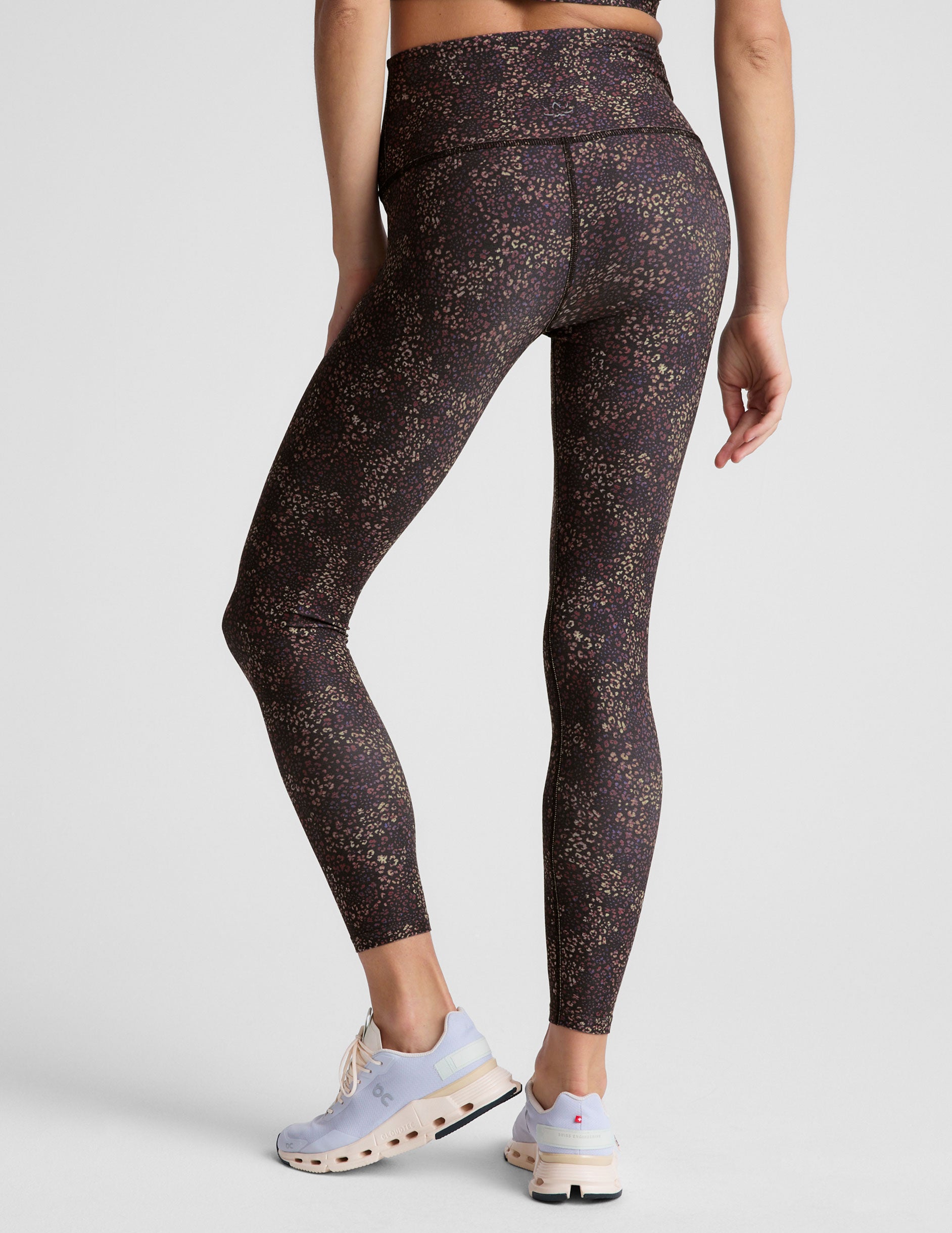 leopard printed high-waisted midi length leggings. 