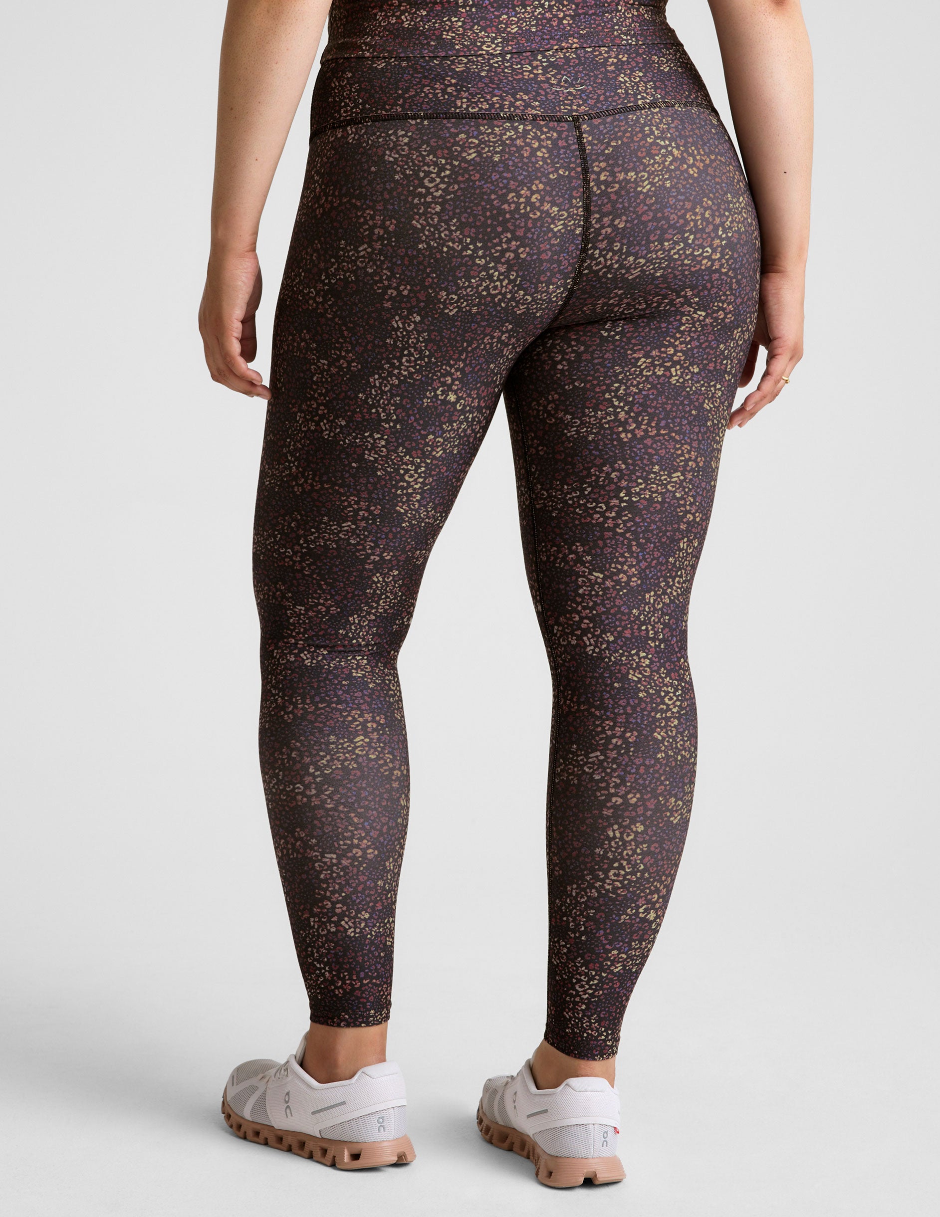 leopard printed high-waisted midi length leggings. 