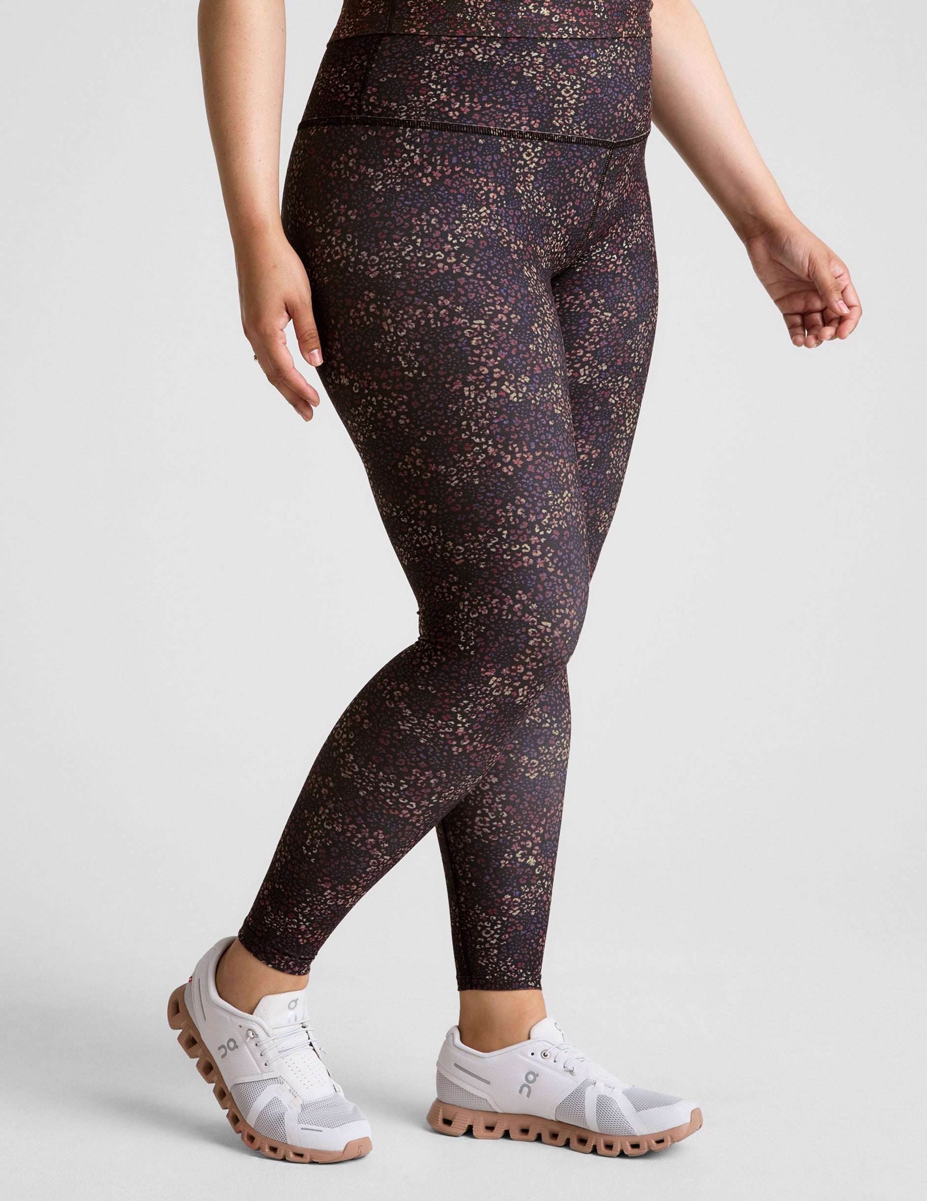 leopard printed high-waisted midi length leggings. 