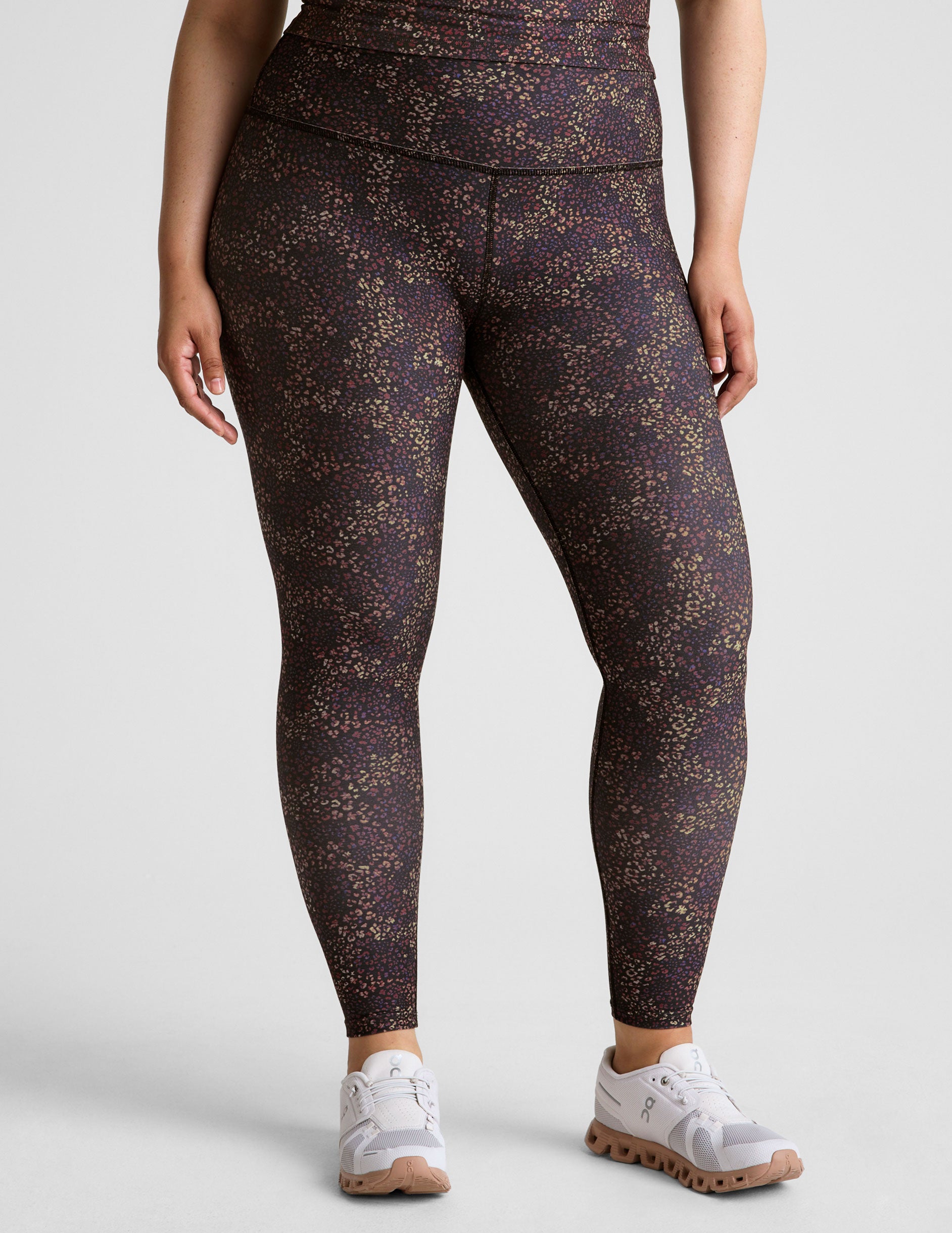 leopard printed high-waisted midi length leggings. 