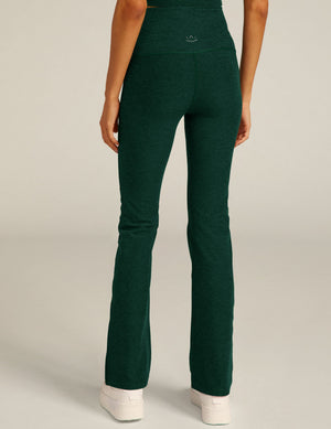 Rear view of emerald Spacedye Practice High Waisted Bootcut Pant showing marled fabric, wide waistband and flared leg.
