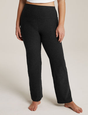 Model wearing black marled Spacedye Practice High Waisted Pant featuring a high-rise wide waistband and bootcut legs.