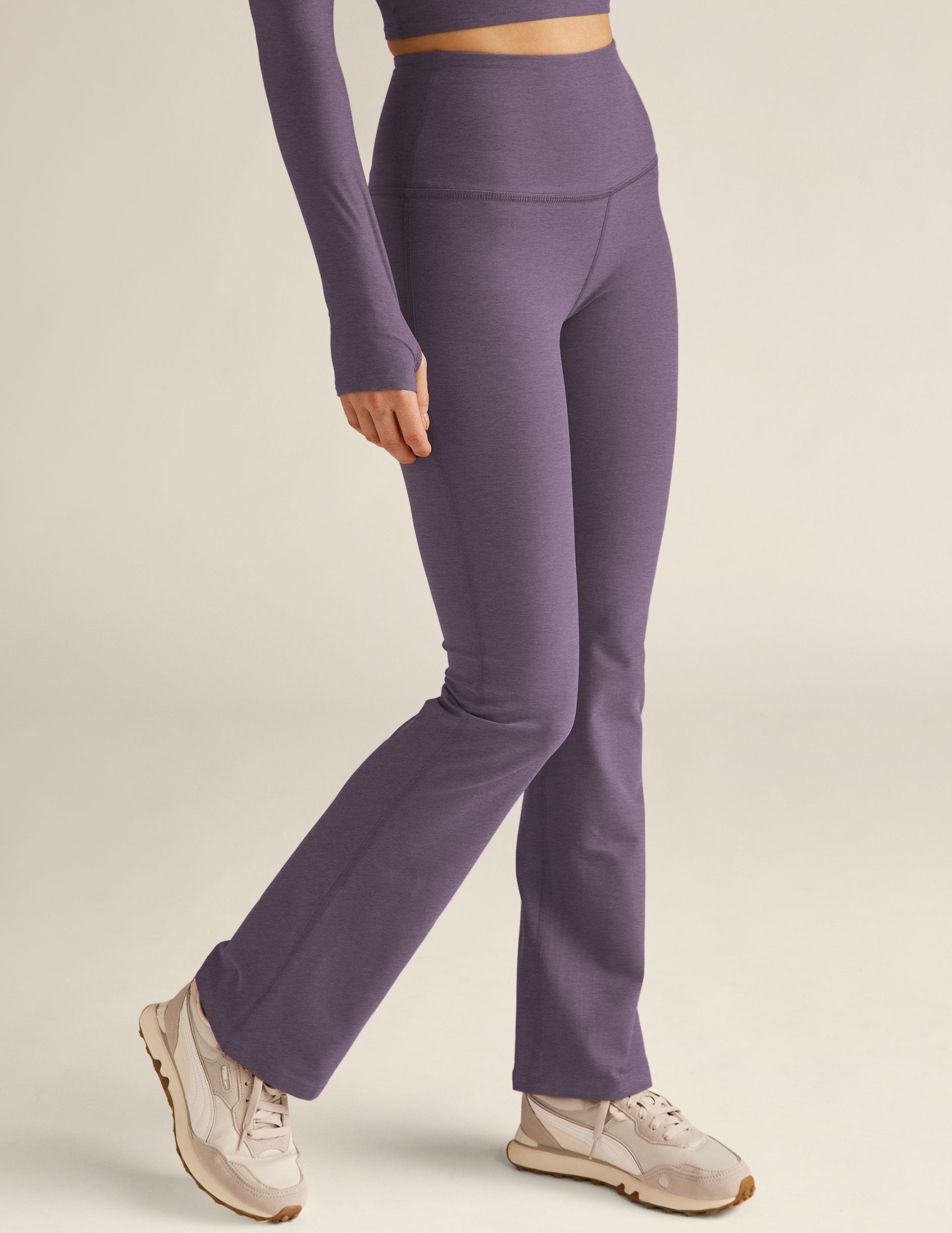 purple high-waisted bootcut pants. 