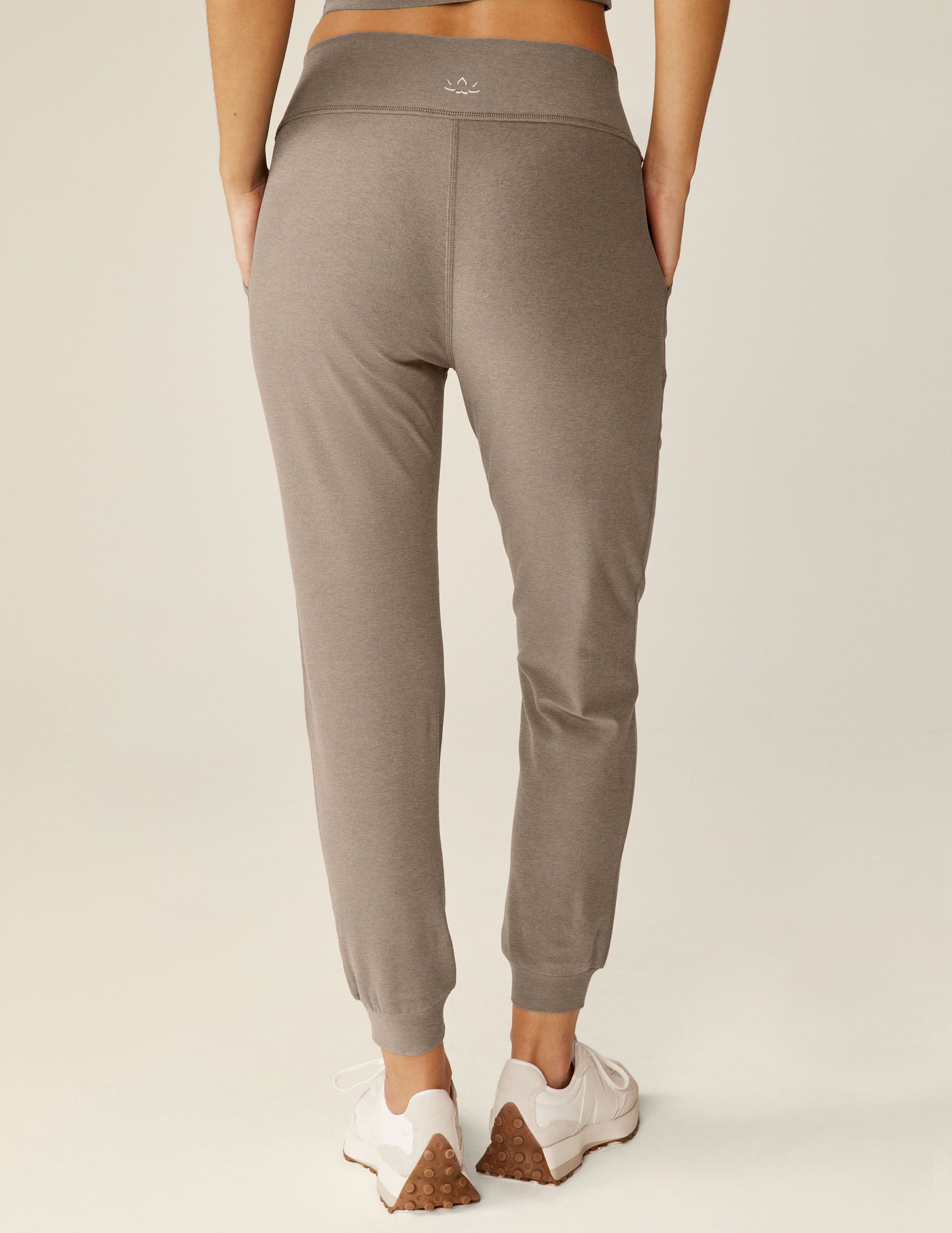 brown high-waisted joggers with pockets. 
