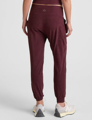 red midi length joggers with pockets. 