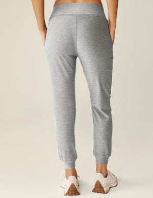 Rear view of the gray marled Spacedye Midi Jogger featuring a slim tapered fit, wide waistband, and banded cuffs.