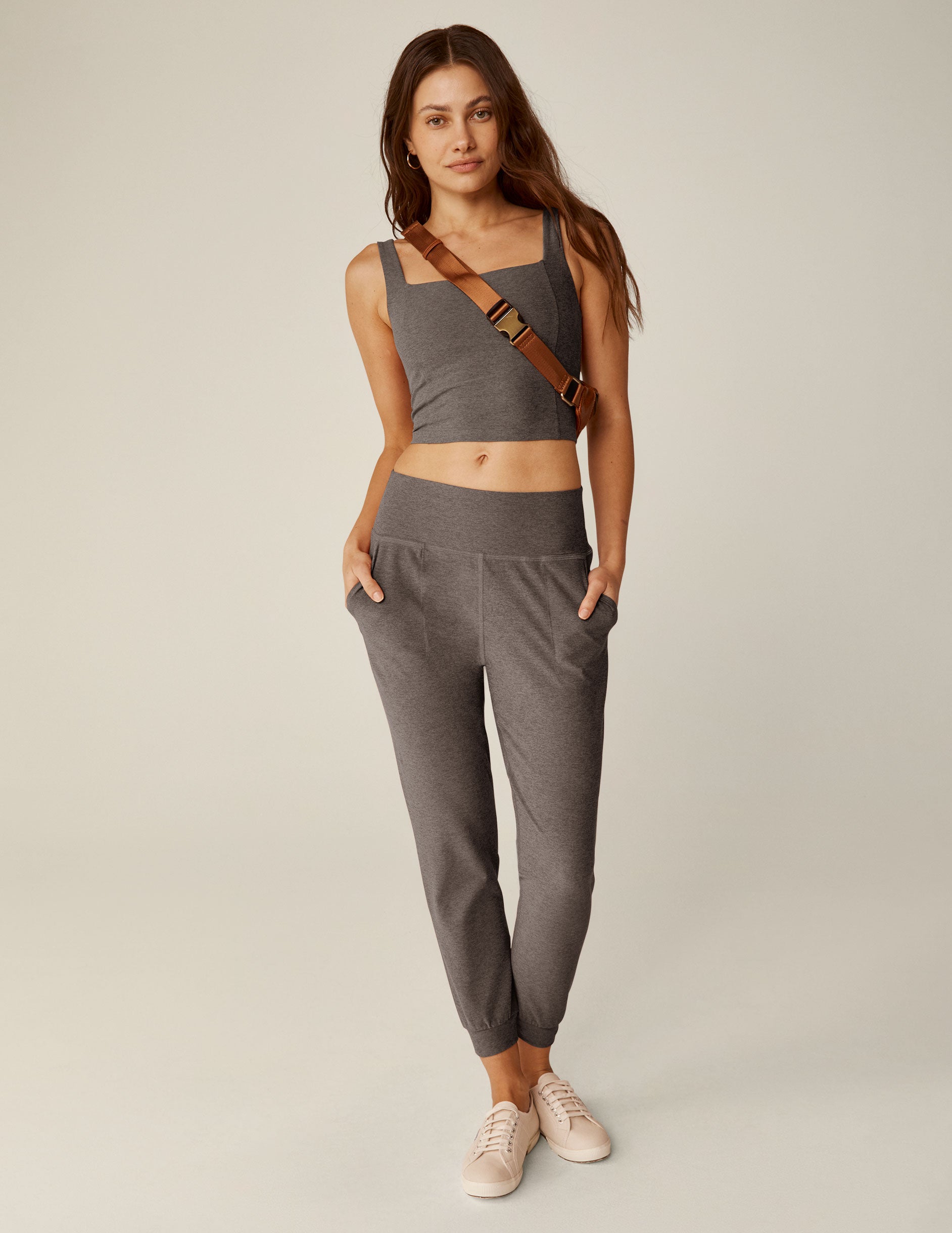 brown high-waisted midi length joggers with pockets. 