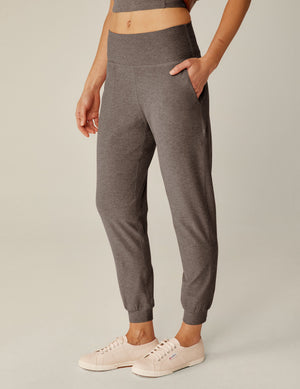 Dark gray marled Spacedye Midi Jogger with a wide waistband, side pockets, and slim tapered legs with banded cuffs.