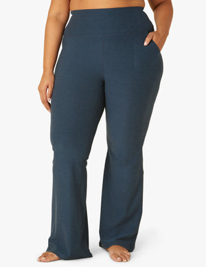 Spacedye All Day Flare High Waisted Pant in nocturnal navy on a model. Features a wide waistband, pockets, and flared legs.