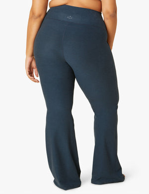 Rear view of navy Spacedye All Day Flare High Waisted Pant with marled texture, high waistband, and flared leg openings.