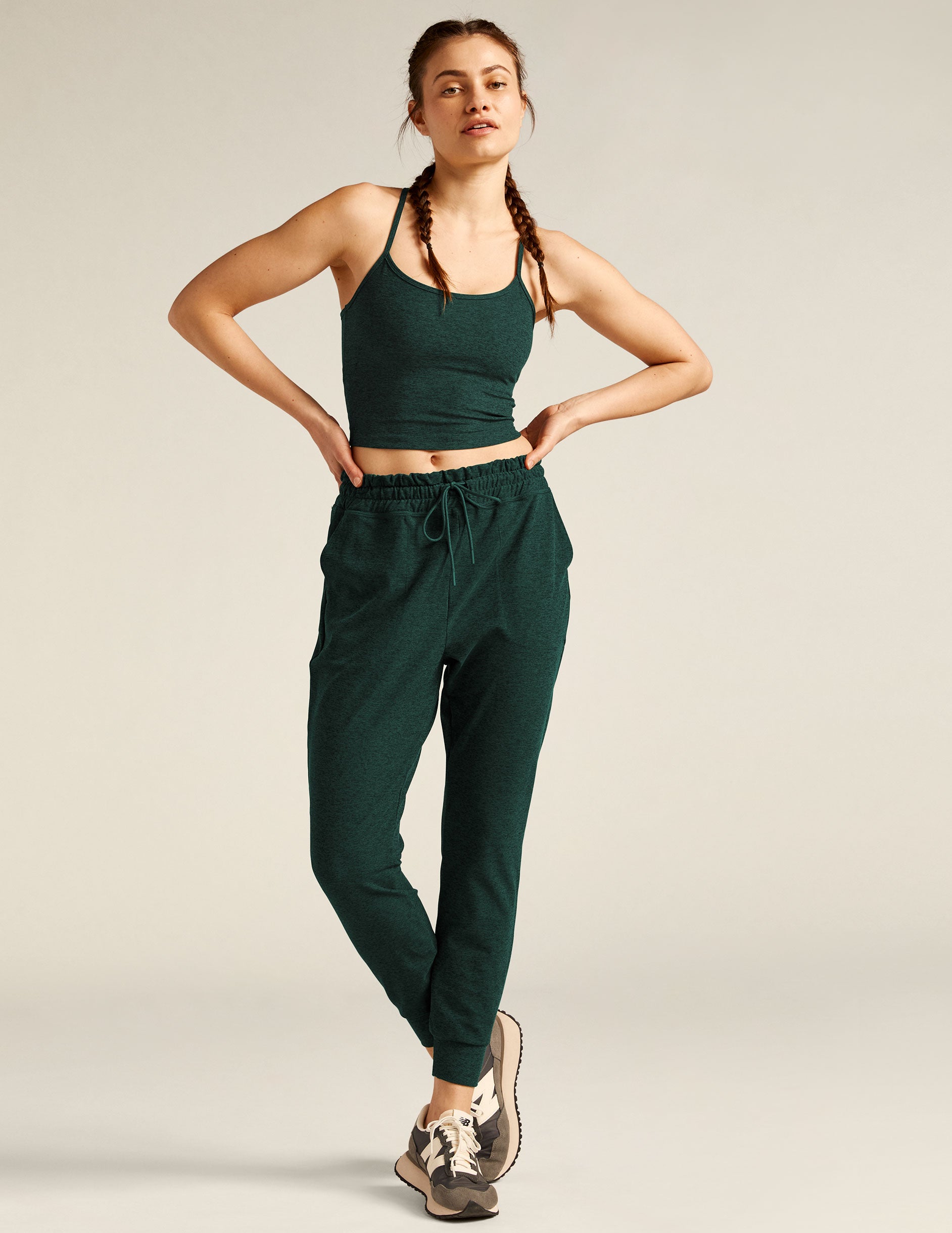 green midi pocket joggers with an elastic waistband and drawstring.