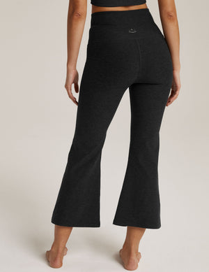 Rear view of Spacedye Retro Cropped Pant in black marled fabric with a high waistband and ankle-length flared legs.