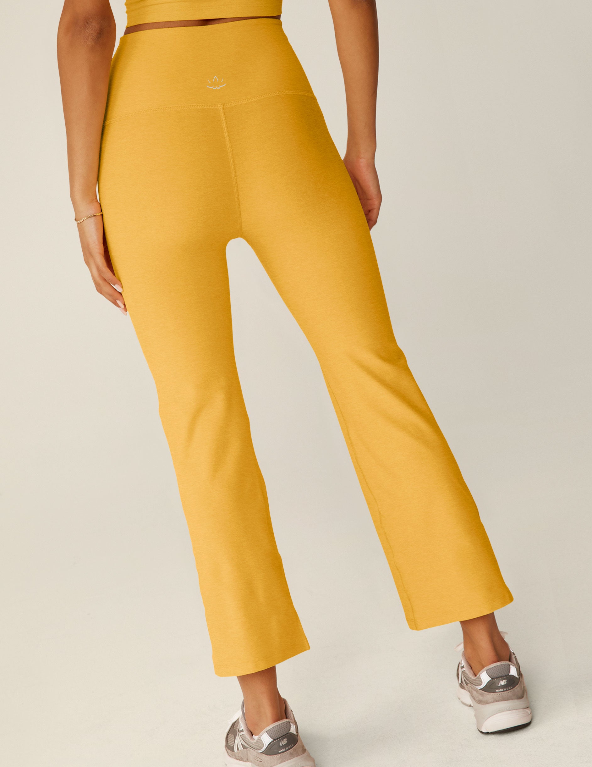 yellow high-waisted cropped flare spacedye pants.