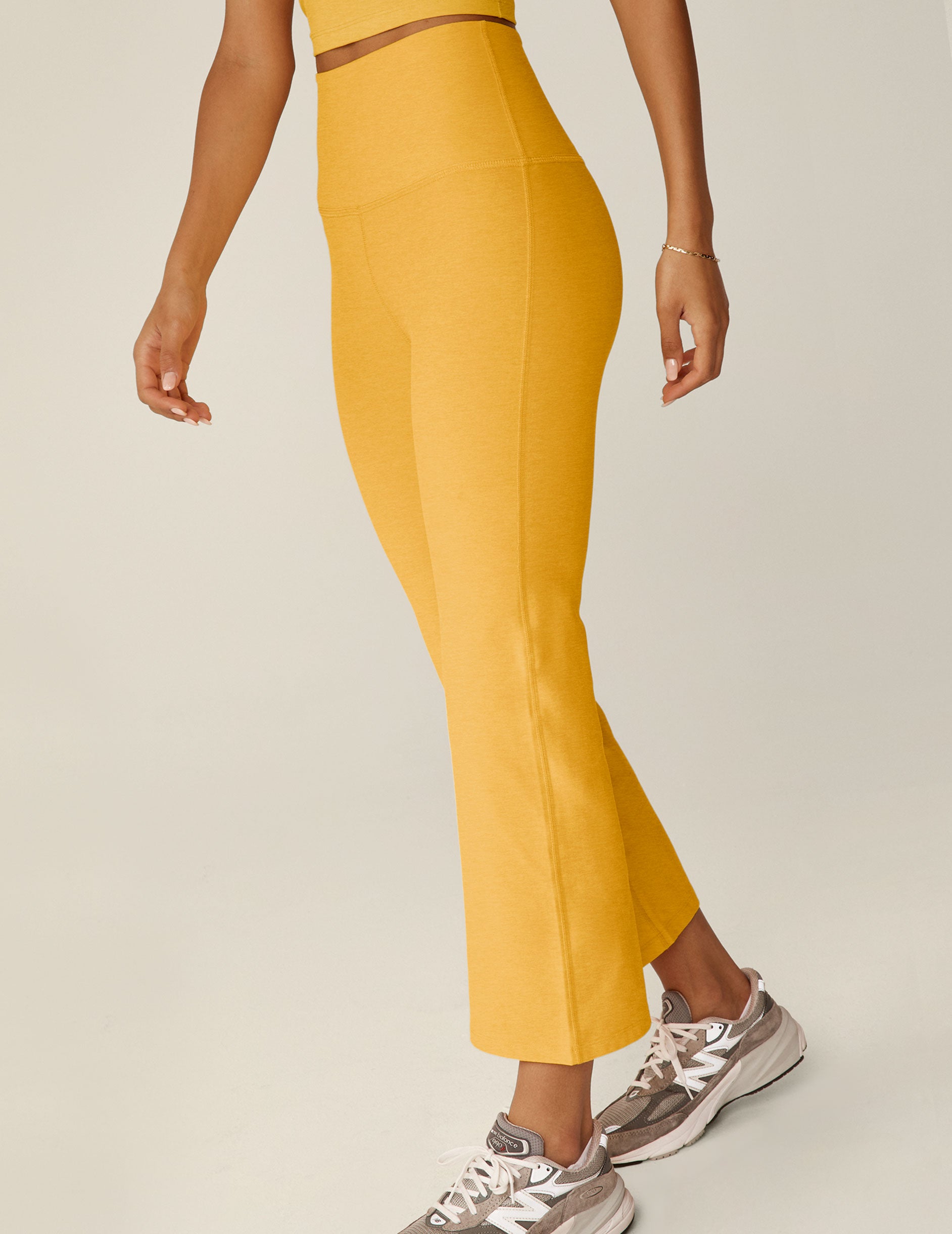 yellow high-waisted cropped flare spacedye pants.