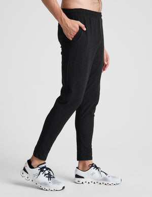 black men's athleisure pants with an internal drawcord and pockets.
