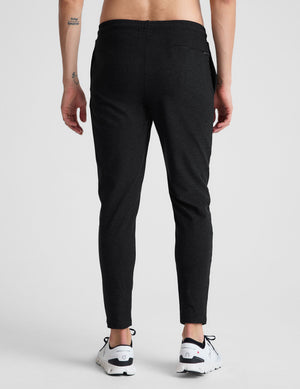 black men's athleisure pants with an internal drawcord and pockets.