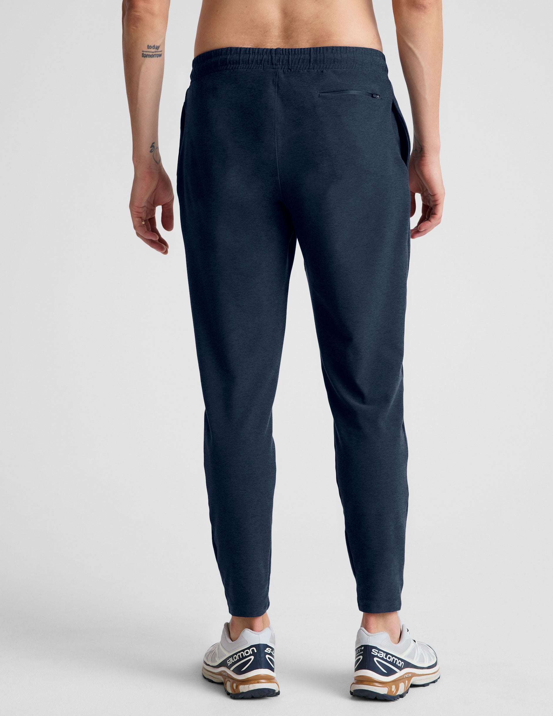 blue men's athleisure pants with an internal drawcord and pockets.