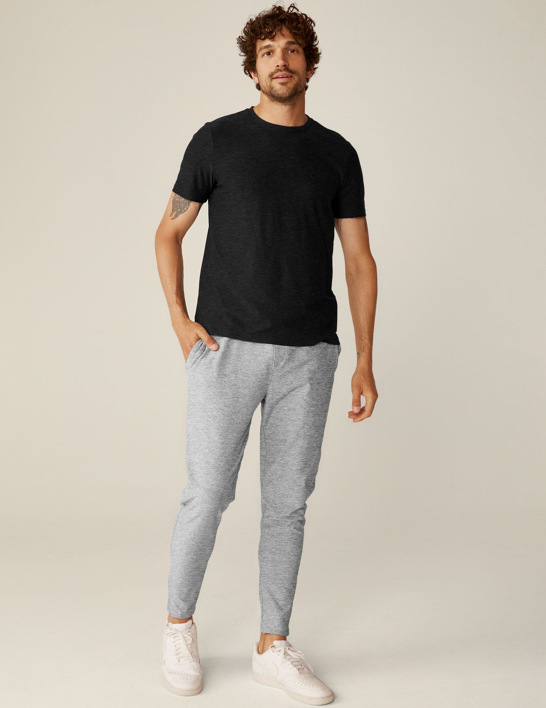 gray men's athleisure pants with an internal drawcord and pockets. 