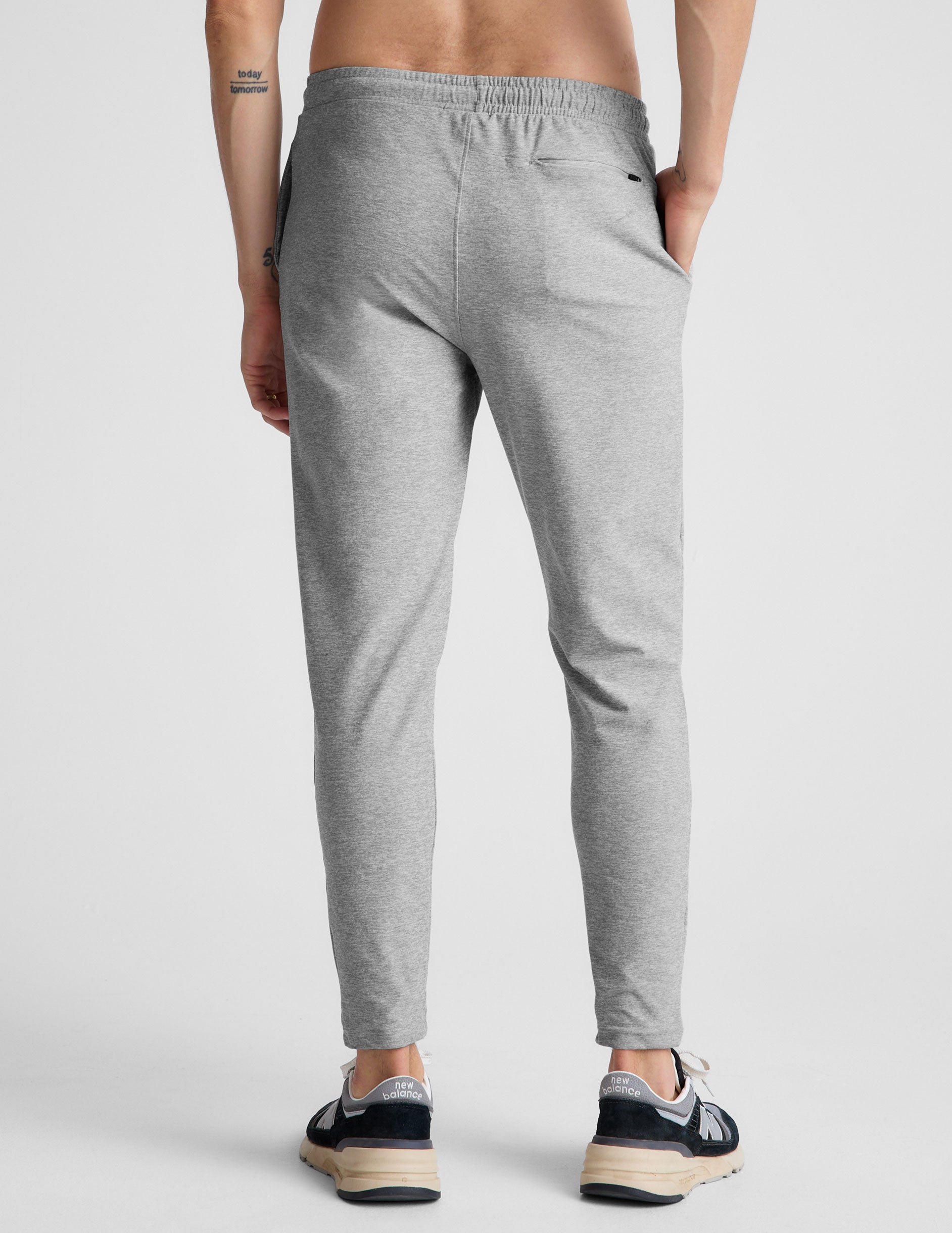 gray men's athleisure pants with an internal drawcord and pockets.