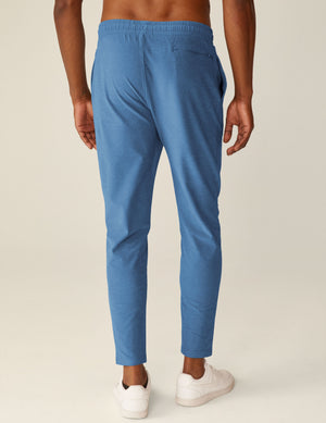 blue men's slim fit athleisure pants. 