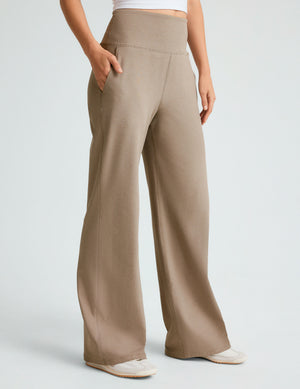 brown high-waisted short length pants with pockets. 