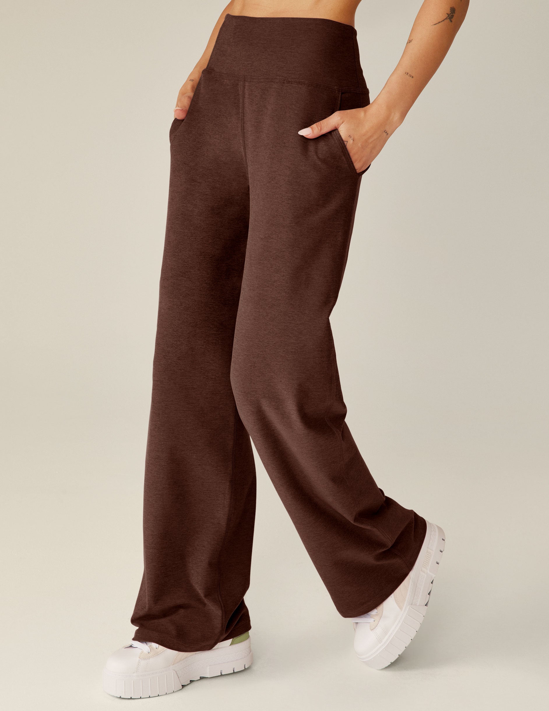 brown high-waisted wide leg pants with pockets. 