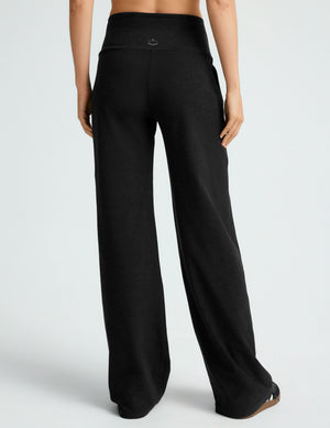 Rear view of the black Spacedye Laid Back Wide Leg Pant featuring a high-waisted fit and relaxed, wide-leg silhouette.