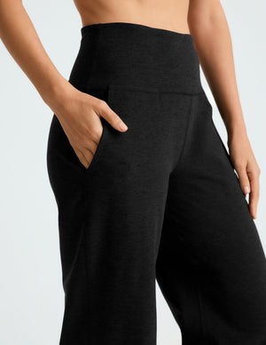 Black Spacedye Laid Back Wide Leg Pant with a high-rise waistband and a hand in the slanted side pocket.