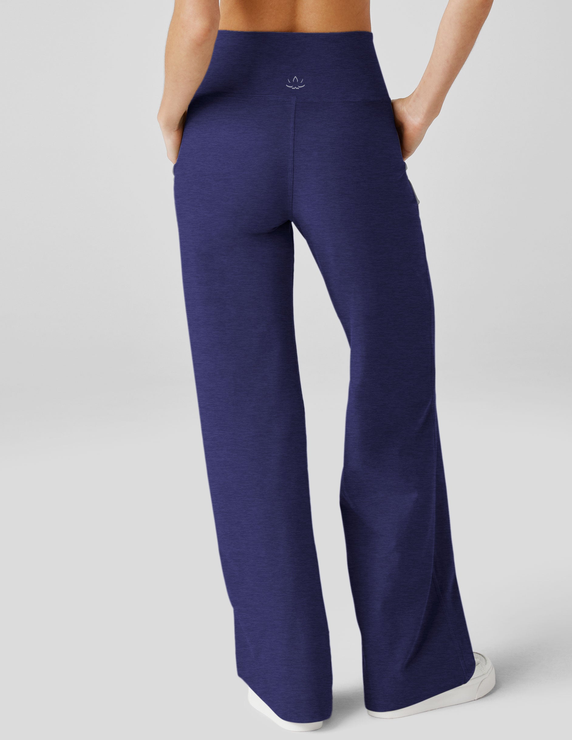 blue high-waisted pants with pockets. 