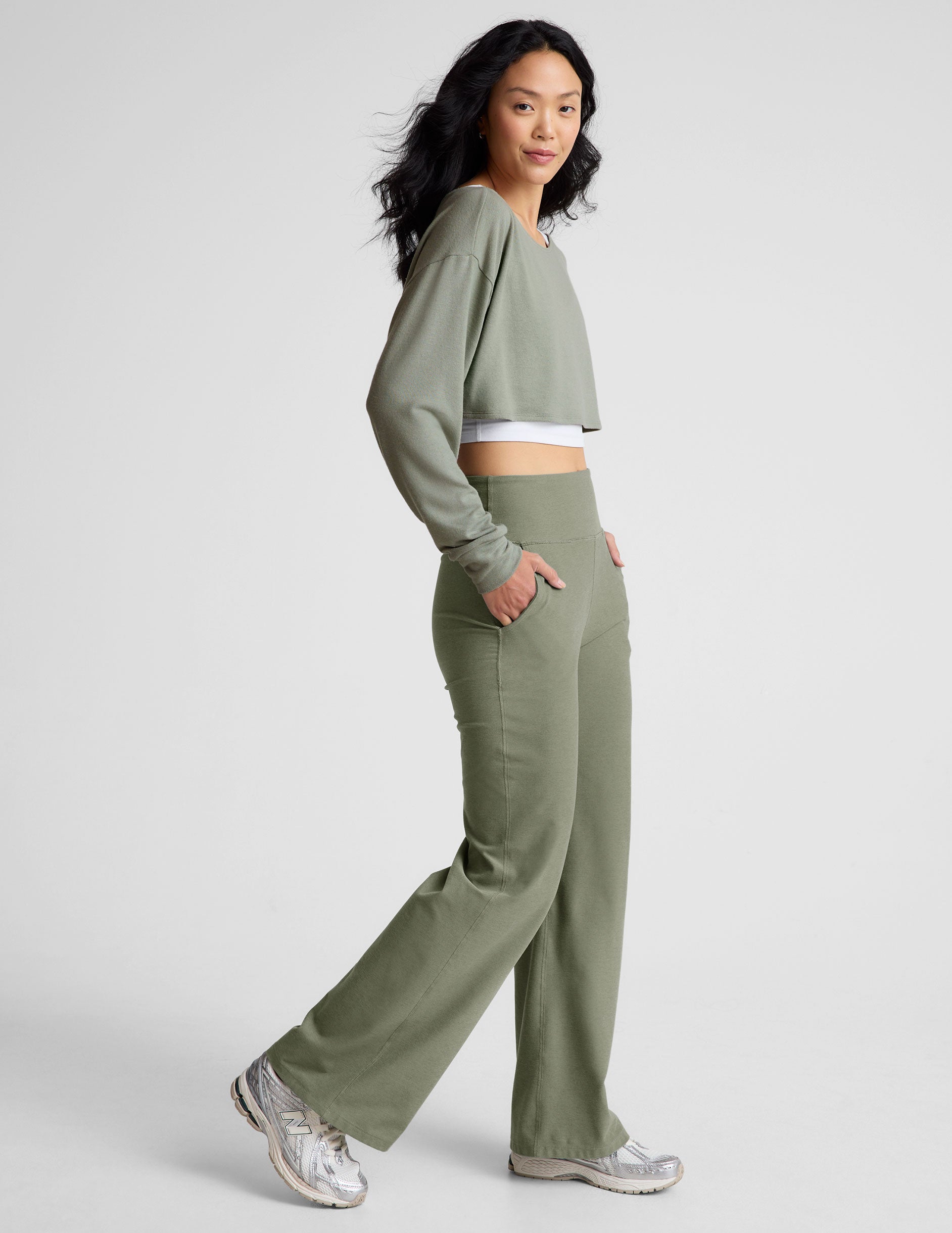 green high-waisted wide leg pants with pockets. 