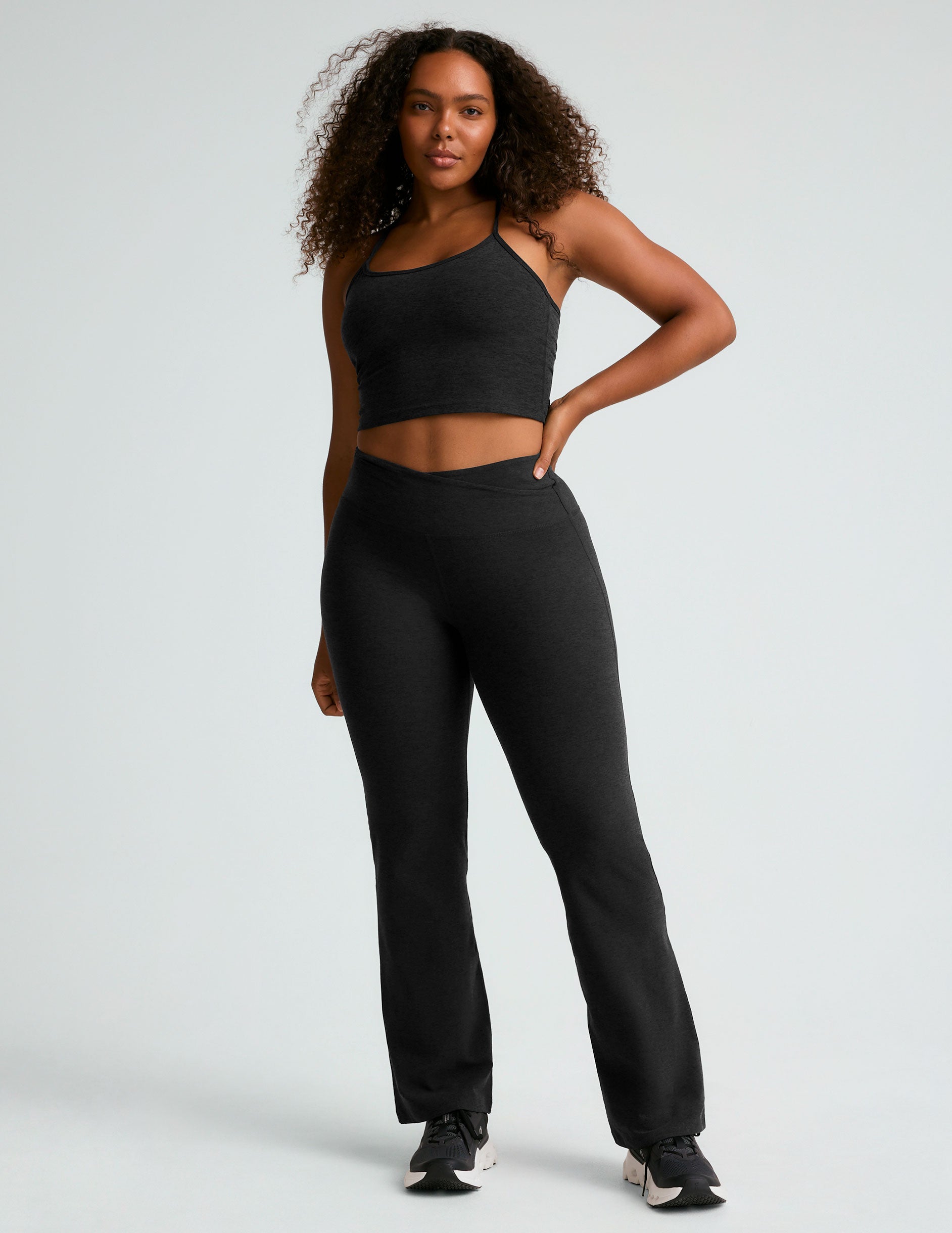 black midi flare pant with criss cross front detail