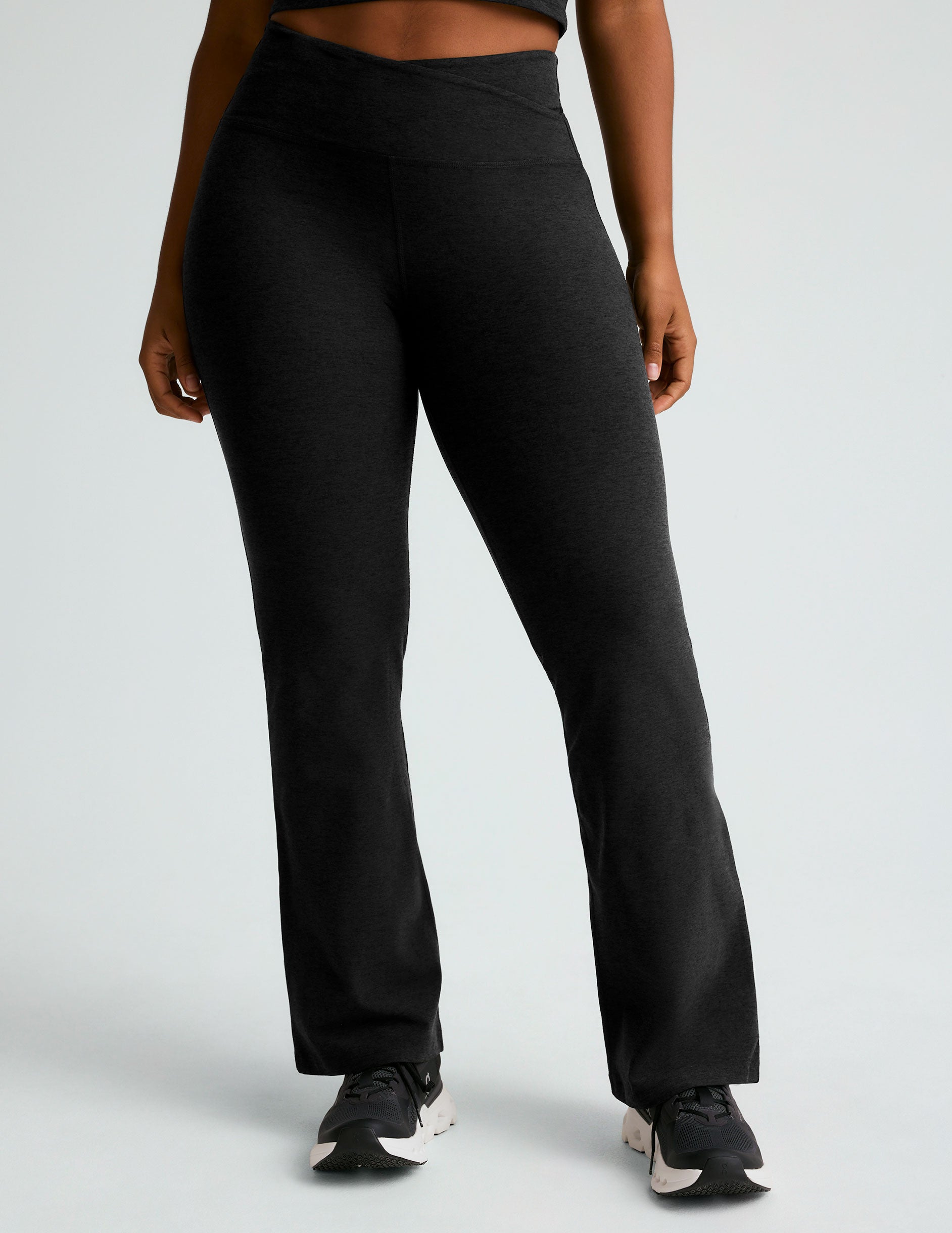 black midi flare pant with criss cross front detail