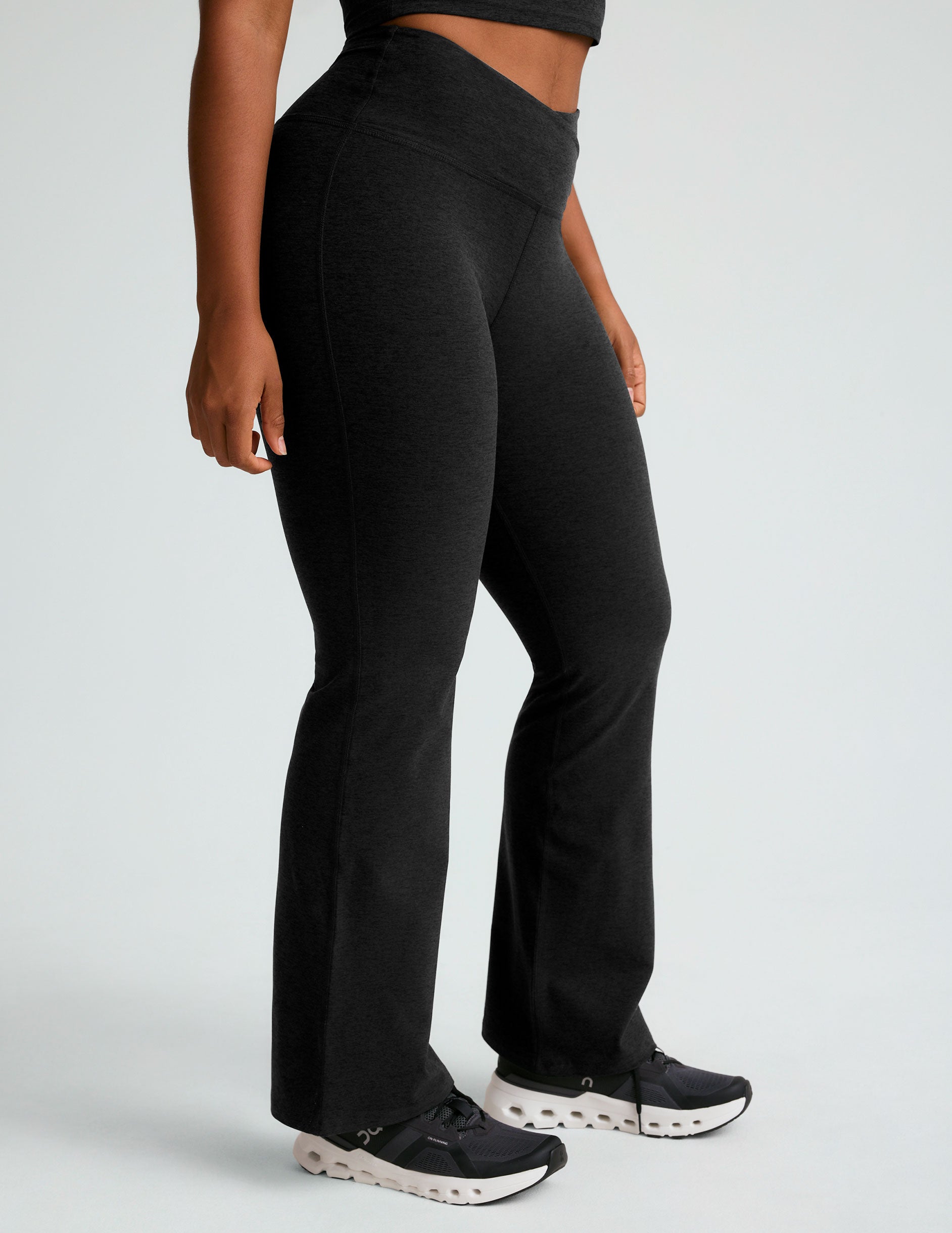 black midi flare pant with criss cross front detail