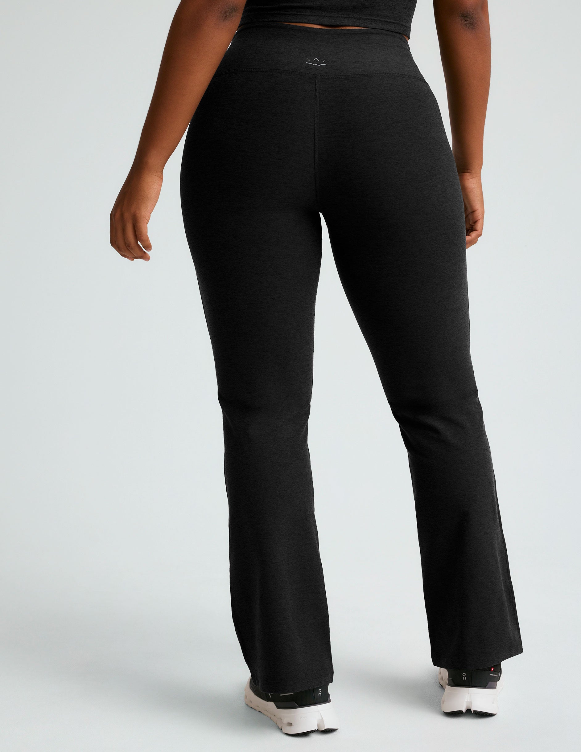 black midi flare pant with criss cross front detail