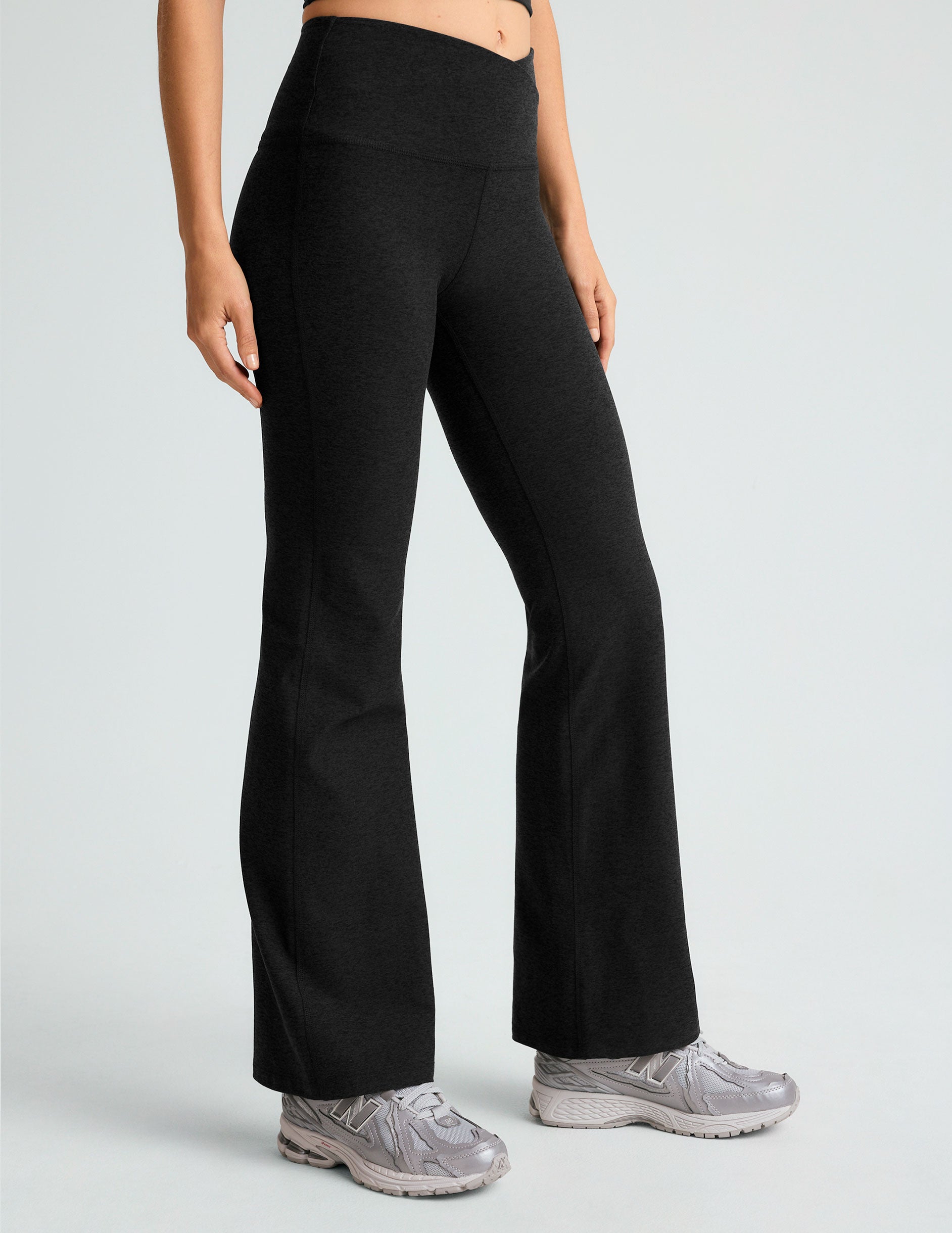 black midi flare pant with criss cross front detail