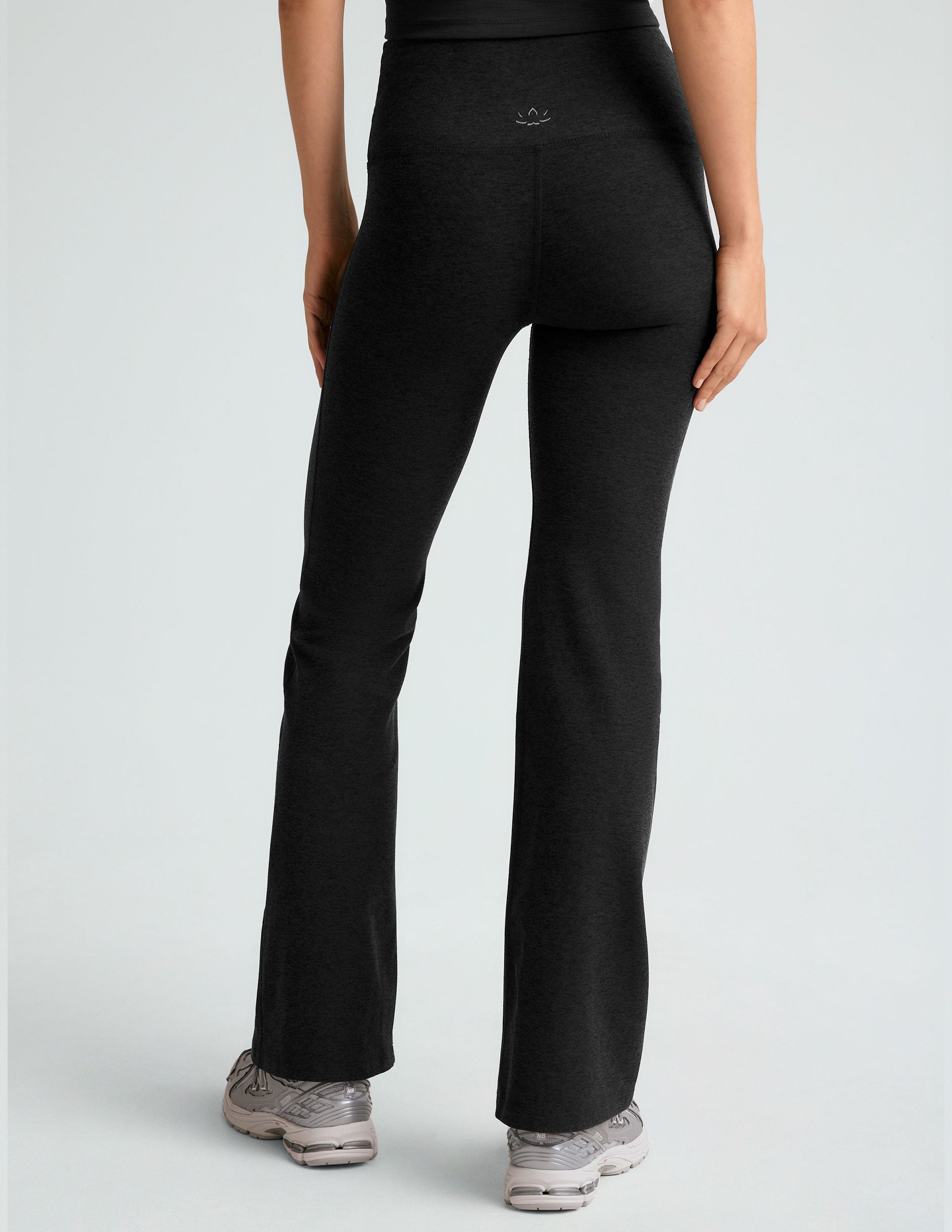 black midi flare pant with criss cross front detail