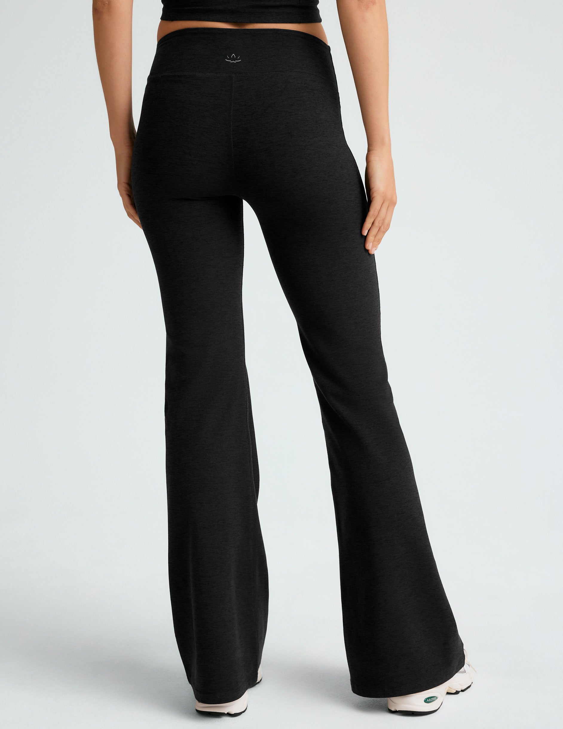 black low-waisted flare leggings.