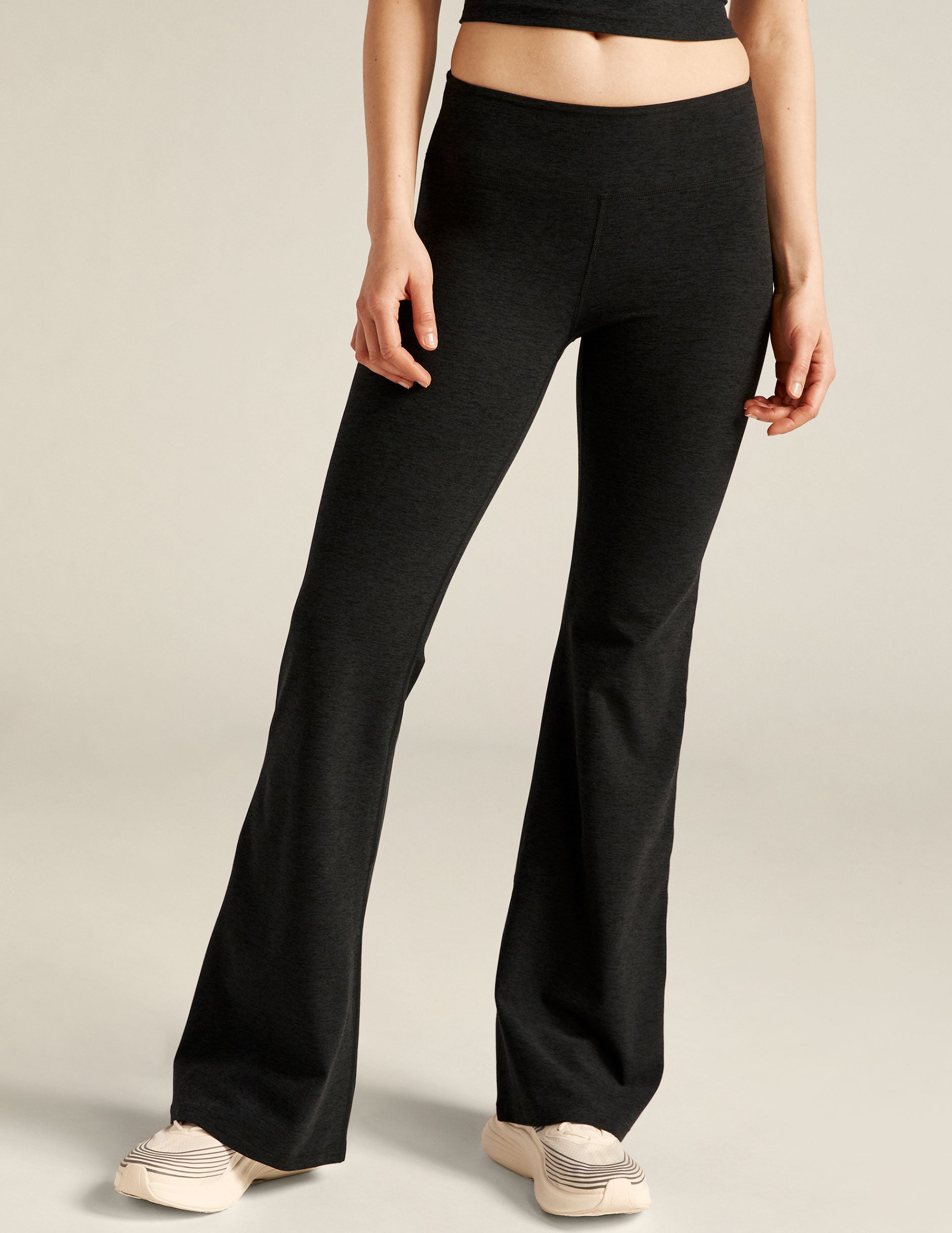 black low-waisted flare leggings.