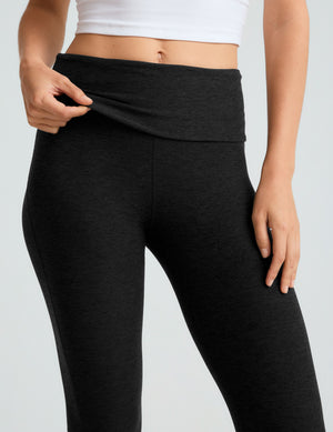 Close-up of Spacedye Foldover Bootcut Pant in black featuring a wide overlapping high-rise waistband shown in a close-up.